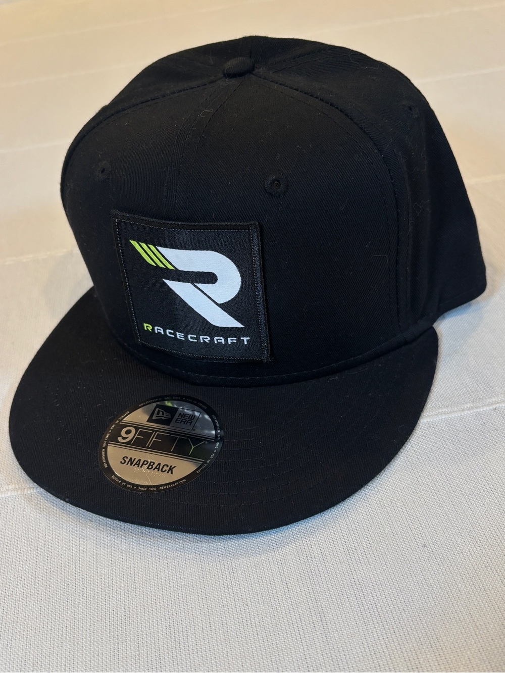 NEW ERA 9FIFTY Racecraft Snapback Hat – Black